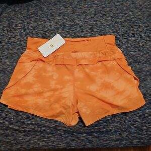 Fabletics Vibrant Orange Athletic Shorts